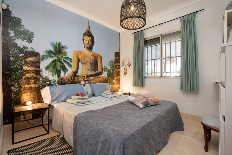 Villa Fahala slaapkamer met buddhabehang